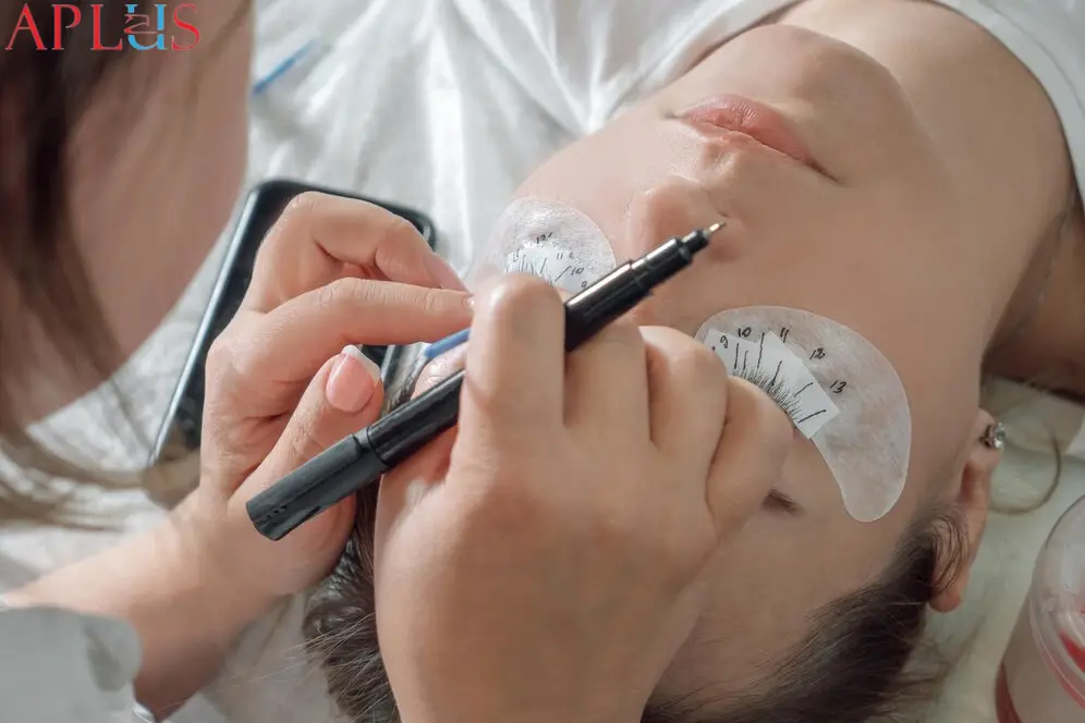 Plan the lash placement according to the client's eye shape and desired style.