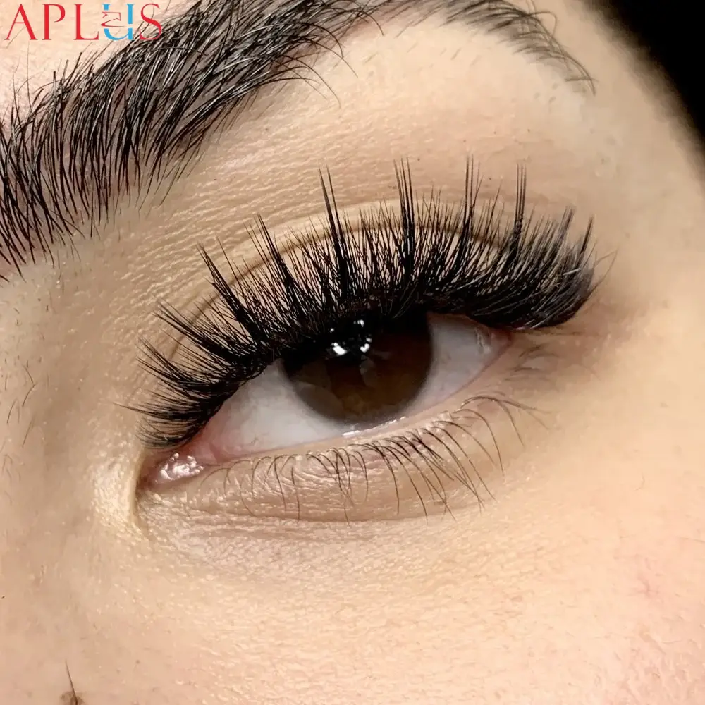 Hybrid eyelash extensions blend classic and volume lash techniques